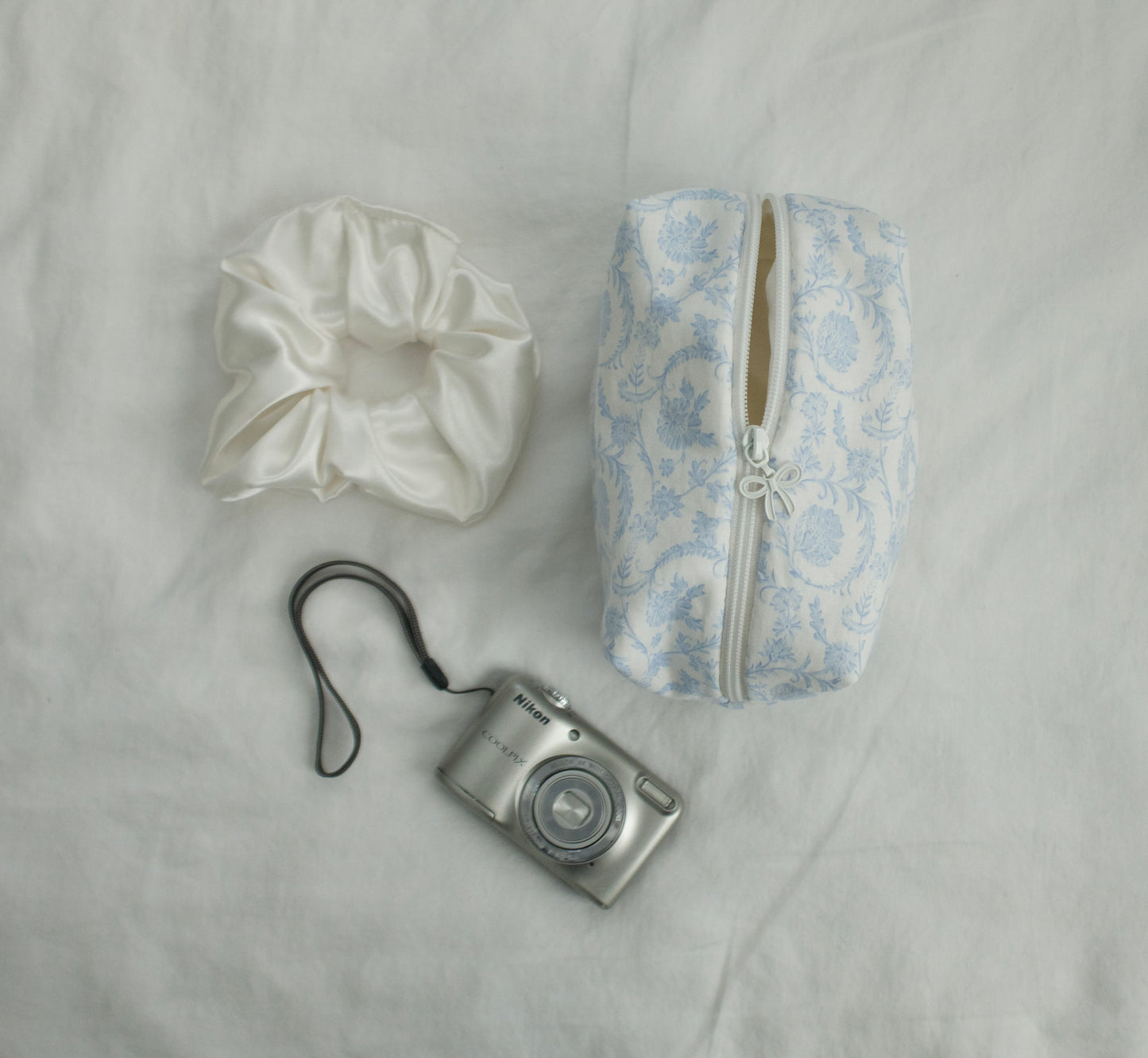 blue forget-me-not makeup pouch